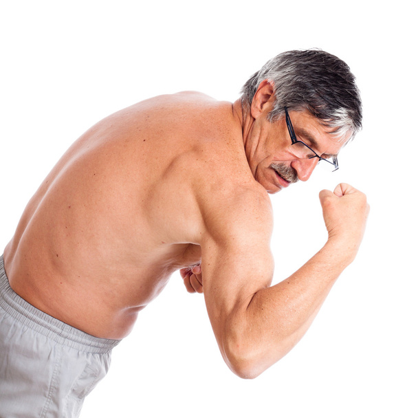 starszy mężczyzna wyświetlone biceps - Zdjęcie, obraz
