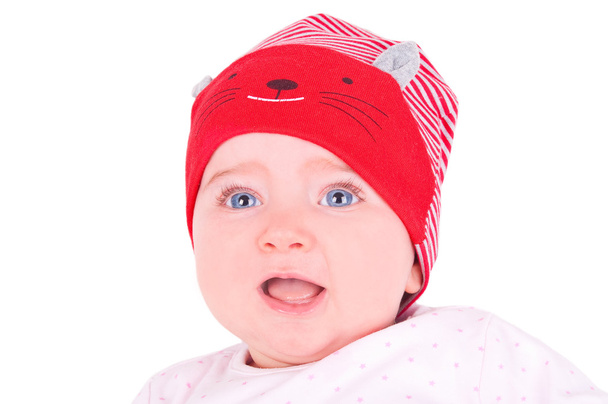 Kırmızı şapkalı kız bebek. - Fotoğraf, Görsel