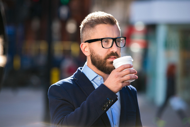 Businessman drinking coffee in London	 - Foto, Imagem