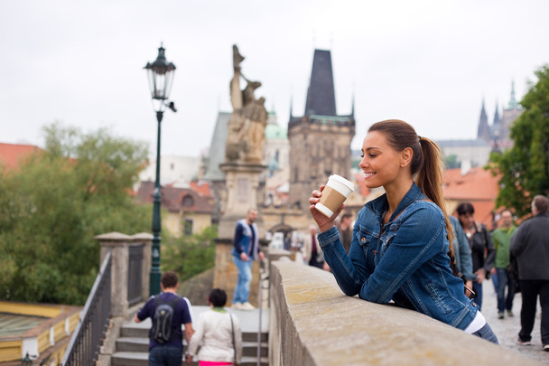 young woman in prague enjoying a coffee - Fotografie, Obrázek