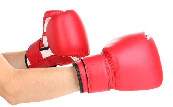 Red boxing gloves on hands isolated on white - Фото, изображение
