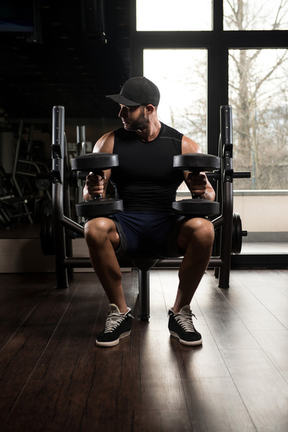 Young Man With Dumbbells Resting Time - 写真・画像