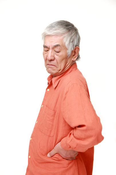 senior Japanese man suffers from lumbago - Fotografie, Obrázek