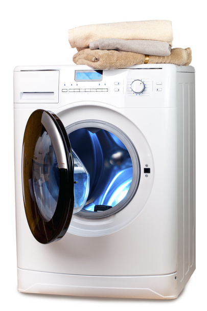 The washing machine with an open door and linen - Foto, Imagen