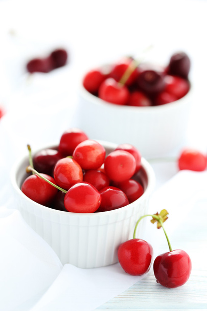 Ripe cherries in bowl - 写真・画像