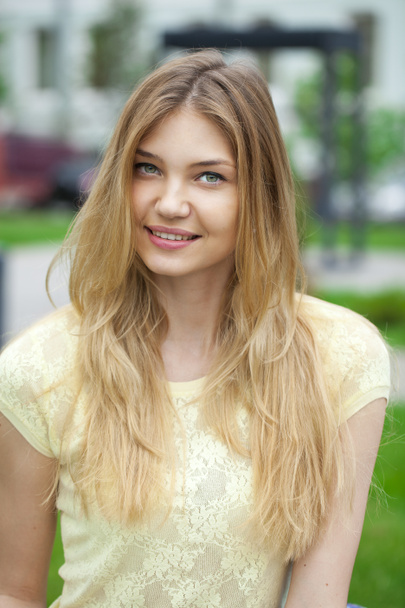 Portrait close up of young beautiful blonde woman - 写真・画像