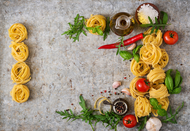 Pasta Tagliatelle nests and ingredients - Photo, Image