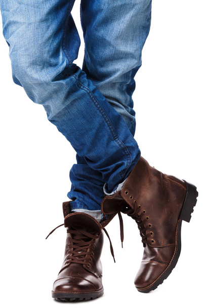 Male legs in jeans and leather boots - Foto, Bild