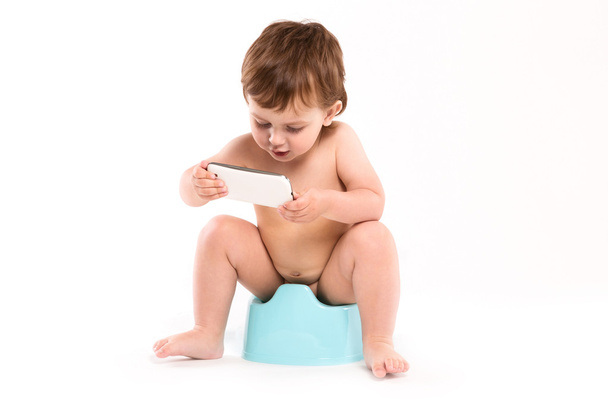 child sitting on the potty - Foto, immagini