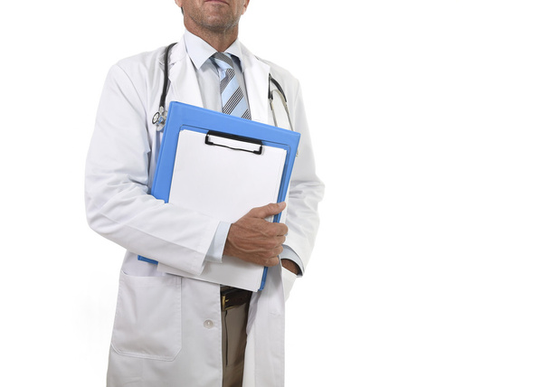 anonymous corporate portrait of confident male medicine doctor with stethoscope holding clipboard - Photo, Image
