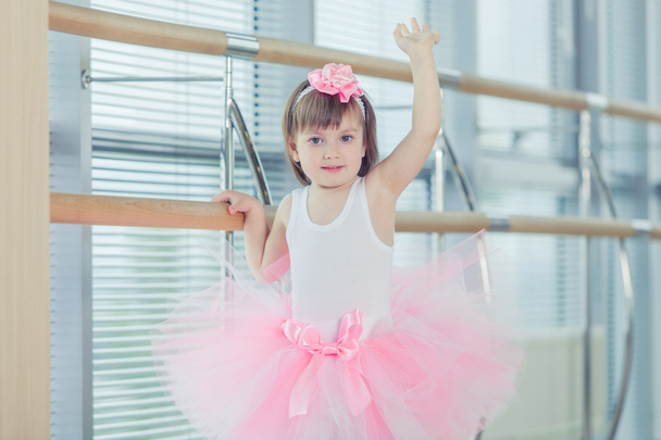 Adorable child dancing classical ballet in studio. - Fotografie, Obrázek