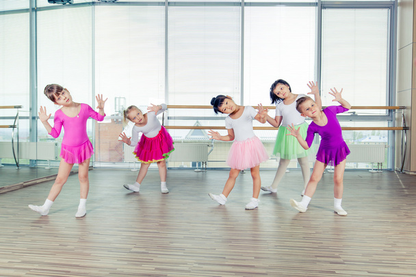 happy children dancing on in hall, healthy life, kids togetherness and happiness concept - Фото, зображення