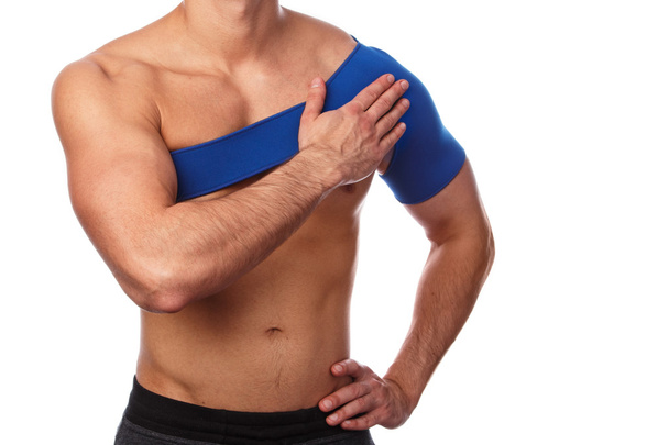 Man with a support bandage on  shoulder - Foto, Imagen