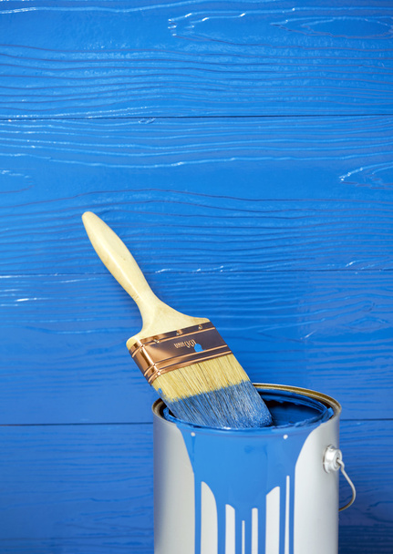 Paint brush in blue color oil paint can - Photo, Image