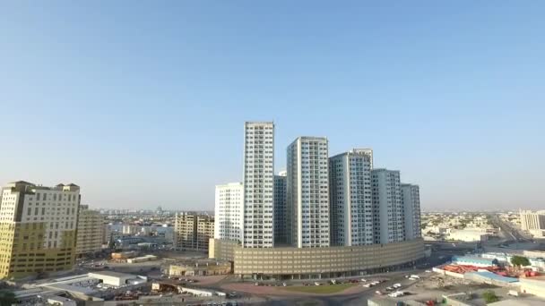 Cityscape of Ajman with modern buildings aerial top view - Materiał filmowy, wideo