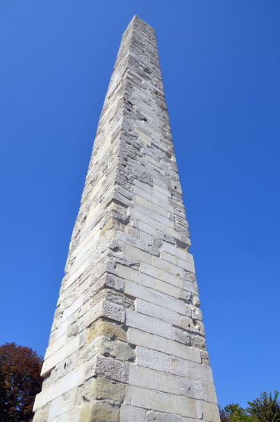 ISTANBUL, TURKEY - SEPTEMBER 26, 2013: Walled Obelisk  Constantine Obelisk is situated near the Serpentine Column at the southern side of the Hippodrome of Constantinople (Sultanahmet Square) in Istanbul, Turkey - 写真・画像