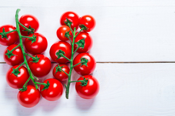 Beautiful background healthy organic a branch cherry tomatoes - Фото, изображение