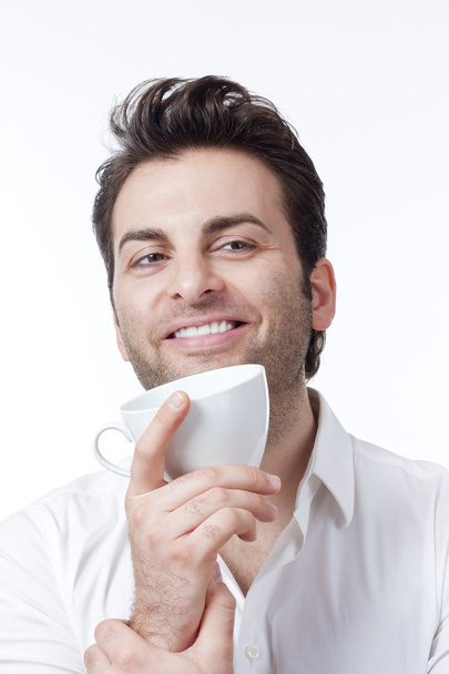 Mężczyzna trzymający filiżankę kawy - Zdjęcie, obraz