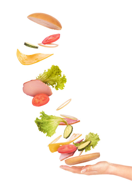 burger with flying ingredients on white background - Foto, Bild