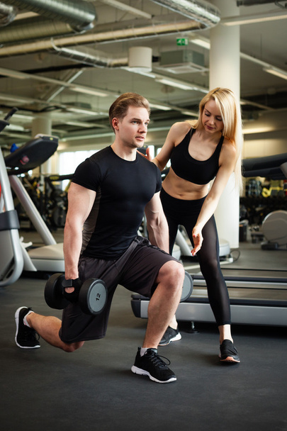 Fitness couple in gym - Photo, Image
