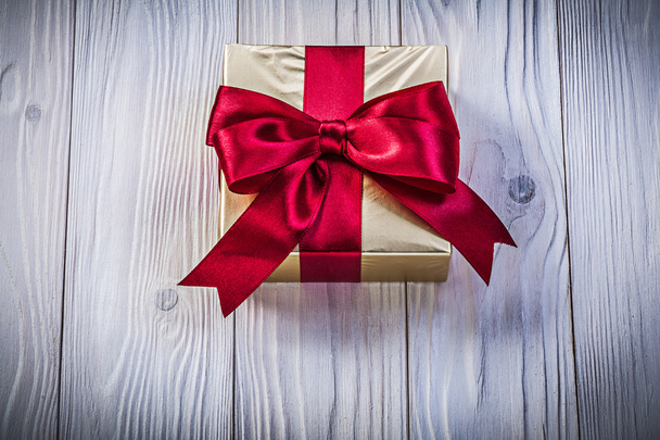 Gift box on wooden board holidays concept - Foto, imagen