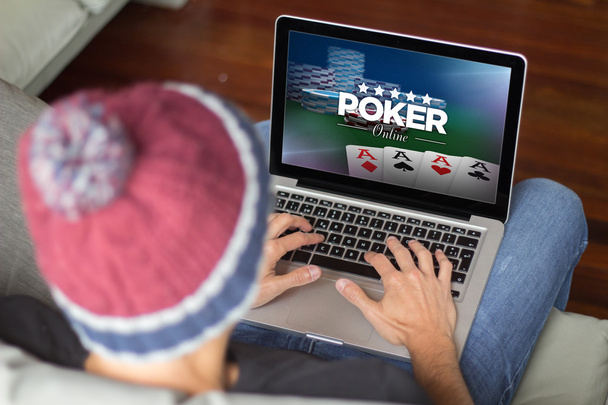 man playing poker online with laptop - Zdjęcie, obraz