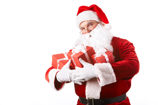 Santa con regalos
 - Foto, Imagen