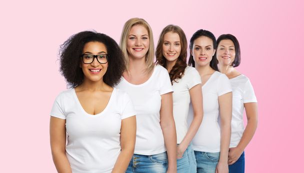group of happy different women in white t-shirts - Фото, изображение