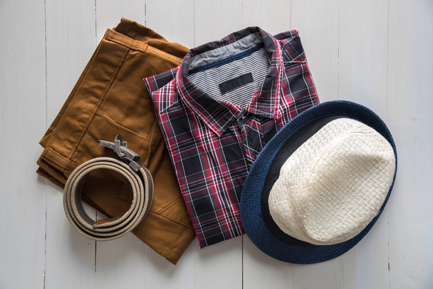 Flat lay of men's casual  fashion on wooden floor - Foto, immagini