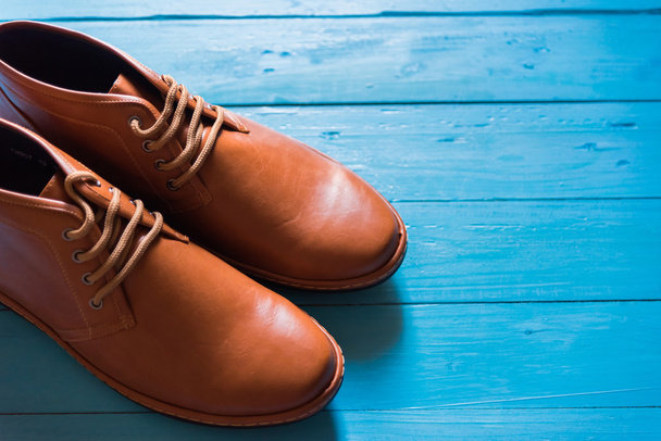 men fashion shoe on wooden floor - Foto, imagen
