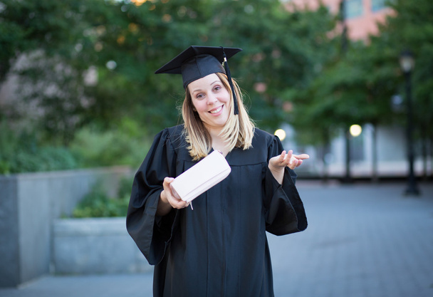 Portrait of female college student in graduation day, broke and  - Photo, Image