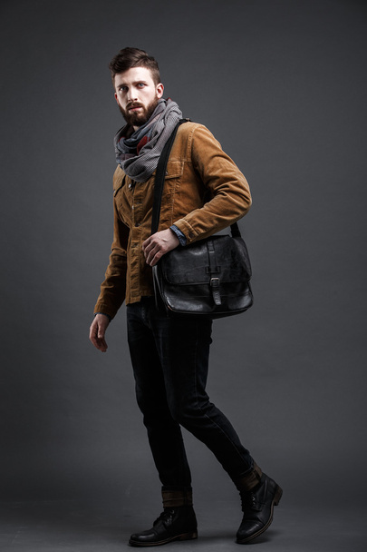 Stylish man with black leather bag - Zdjęcie, obraz