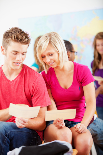 High School: Students Looking at Report Cards - 写真・画像