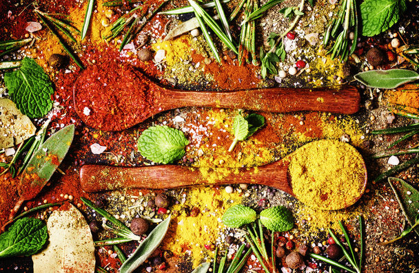 Spices background, food background, mix of oriental spices - Foto, afbeelding