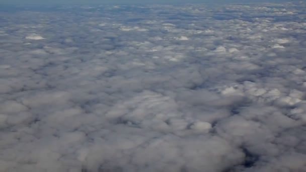 Traveling by air above clouds. View through an airplane window. Flying over the Mediterranean - Footage, Video