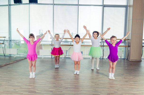 happy children dancing on in hall, healthy life, kids togetherness and happiness concept - Фото, зображення