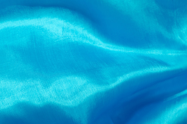 motion blurred blue silk texture background - Foto, afbeelding