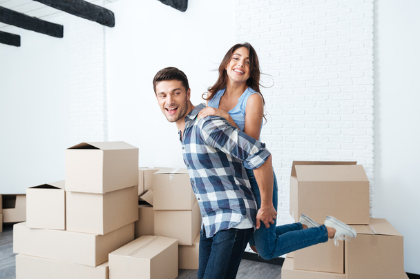 Young couple moving in new house - Photo, Image