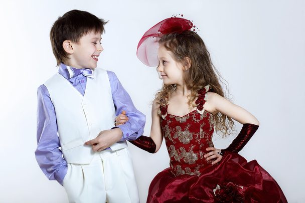 Little girl in beautiful dress and boy - Photo, image
