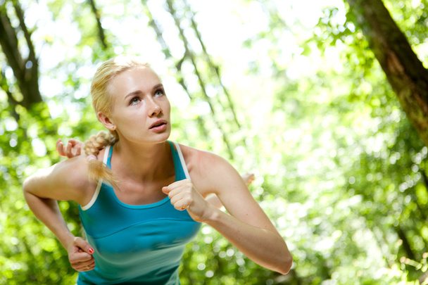 Woman Running Outdoors in Forest - Photo, Image