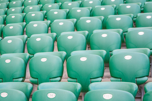 Green plastic seats  at modern stadium - Photo, Image