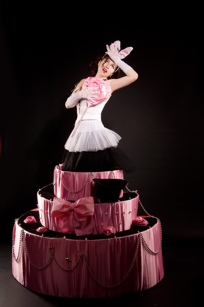 Pin-up girl jumping toy cake - Photo, Image