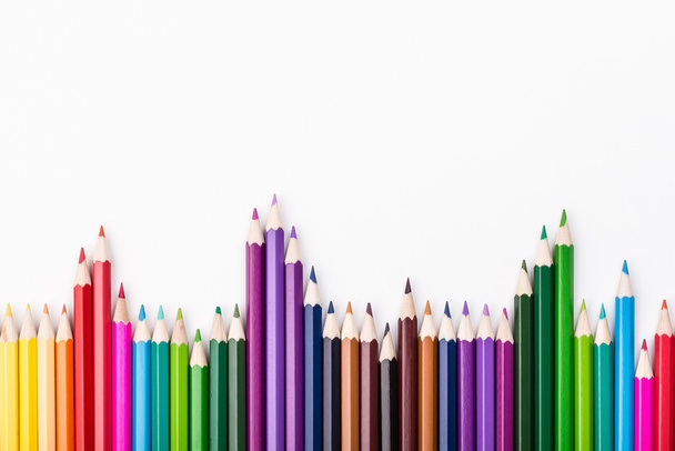 Color pencils arrangement on white - Photo, Image