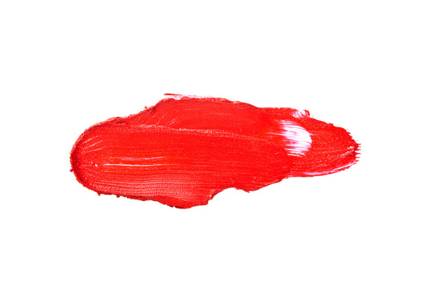 Red color lipstick stroke on white background - 写真・画像