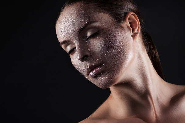 Beauty, fashion, make-up. Woman with glitter on her face. Beauty close-up portrait - Фото, изображение