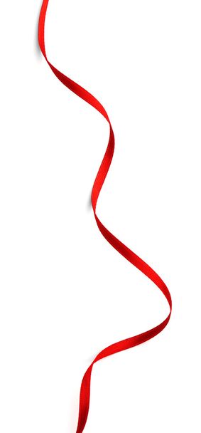 Red ribbon  on white - Φωτογραφία, εικόνα