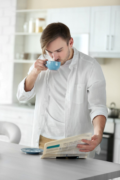handsome man with cup of coffee - Zdjęcie, obraz