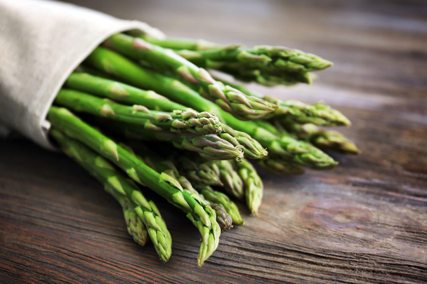 Asparagus on wooden table - Photo, image