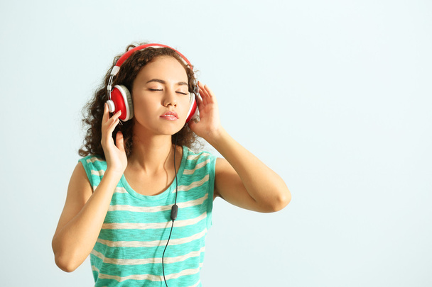 woman listening to music in headphones - Photo, Image