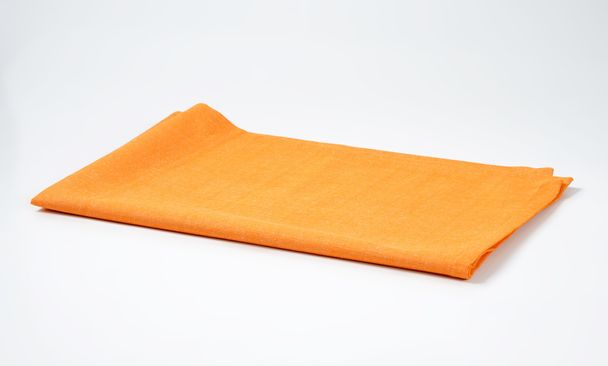 Skládané oranžové ubrousek - Fotografie, Obrázek